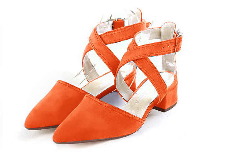 Clementine orange women's open back shoes, with crossed straps. Tapered toe. Low flare heels. Front view - Florence KOOIJMAN